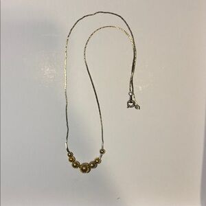Elegant Gold and Silver Beaded Necklace
